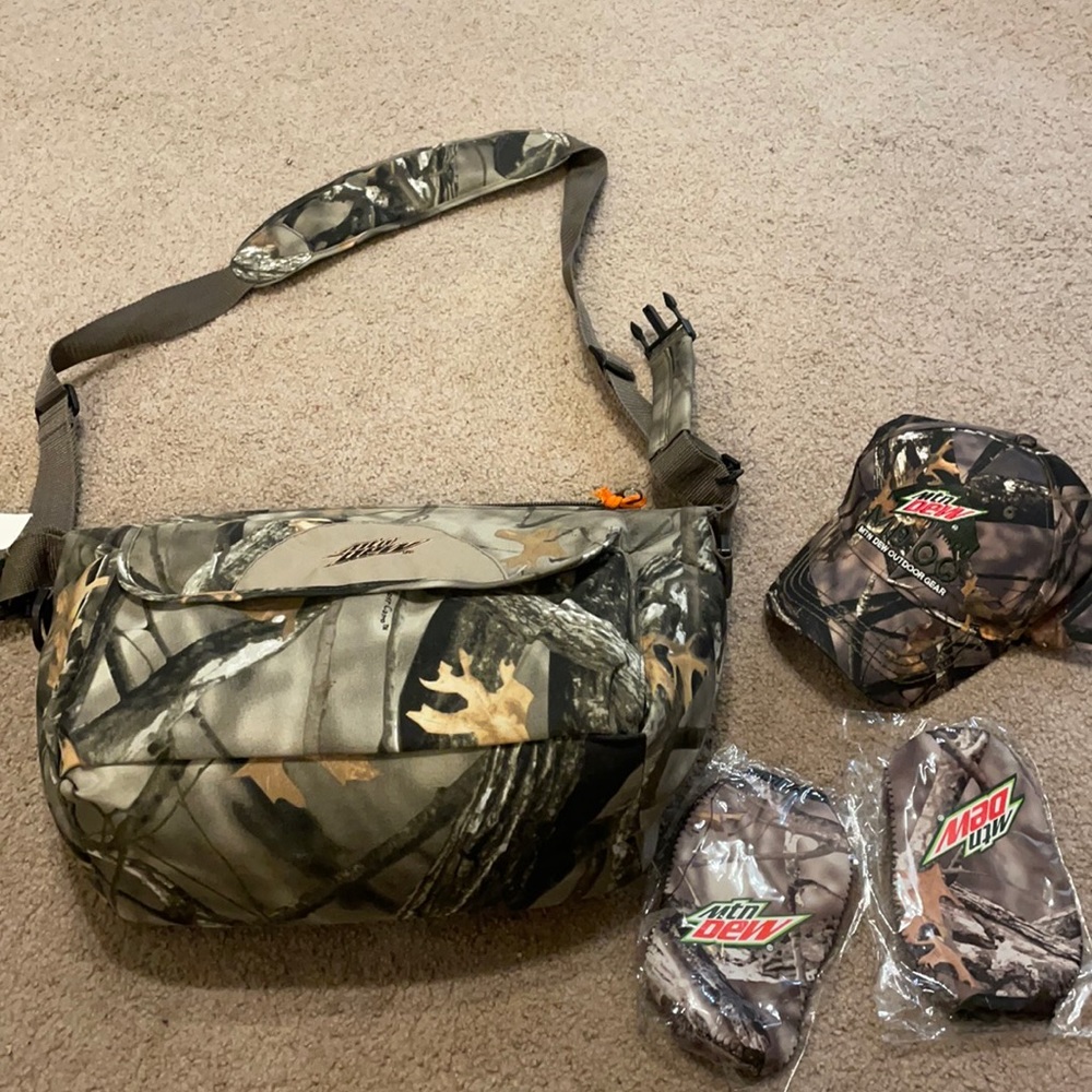Hunter’s Delight: Camouflage zipper bag, 2 Koozies, baseball cap